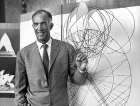 File photo shows Danish architect Utzon displaying a diagram of a detail of Sydney Opera House